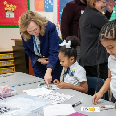 TEA representatives observe students in Cityscape Schools dual language classrooms, highlighting bilingual learning and innovative technology.